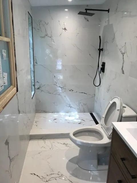 Renovated bathroom by Palm Beach Renovations